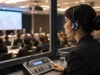 Panduan Memilih Penerjemah Lisan yang Tepat untuk Acara Profesional Interpreter profesional membantu komunikasi antara pembicara bahasa Inggris dan peserta dalam acara internasional
